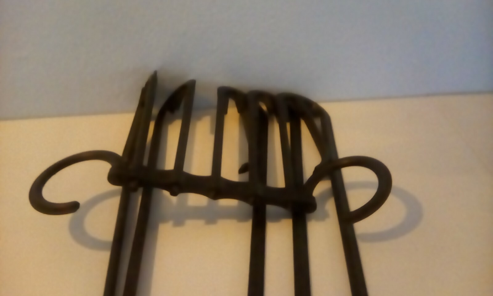 3 Space saver hangers. 5 pairs of pants or other garments.