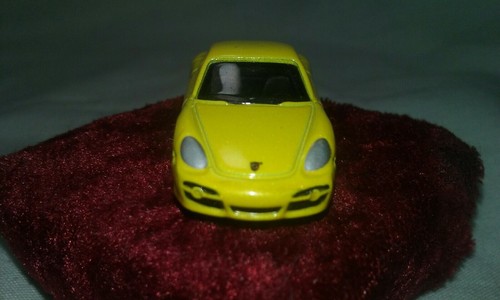 YELLOW HO 1/87th SCALE DIE CAST PORSCHE CAYMAN with RUBBER TIRES