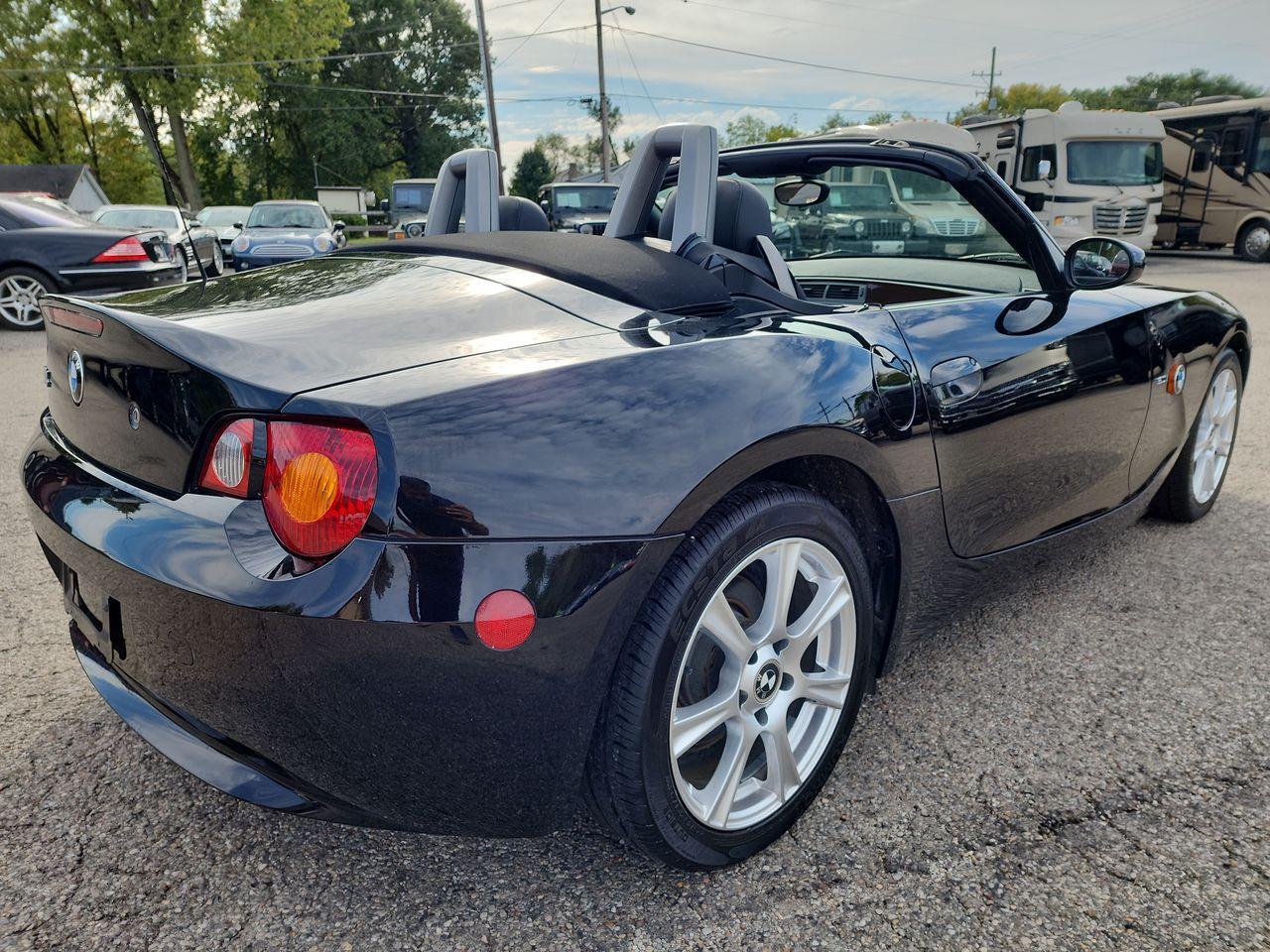 Owner 2003 BMW Z4, JET BLACK WITH BLACK SOFT TOP with 77946 Miles available now!