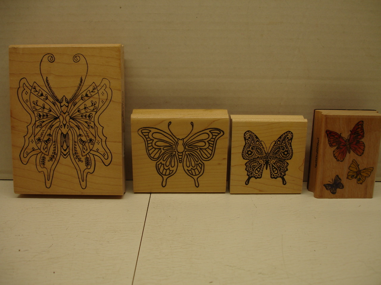 LOT OF SEVEN BUTTERFLY STAMPS WITH THREE COLOR PADS