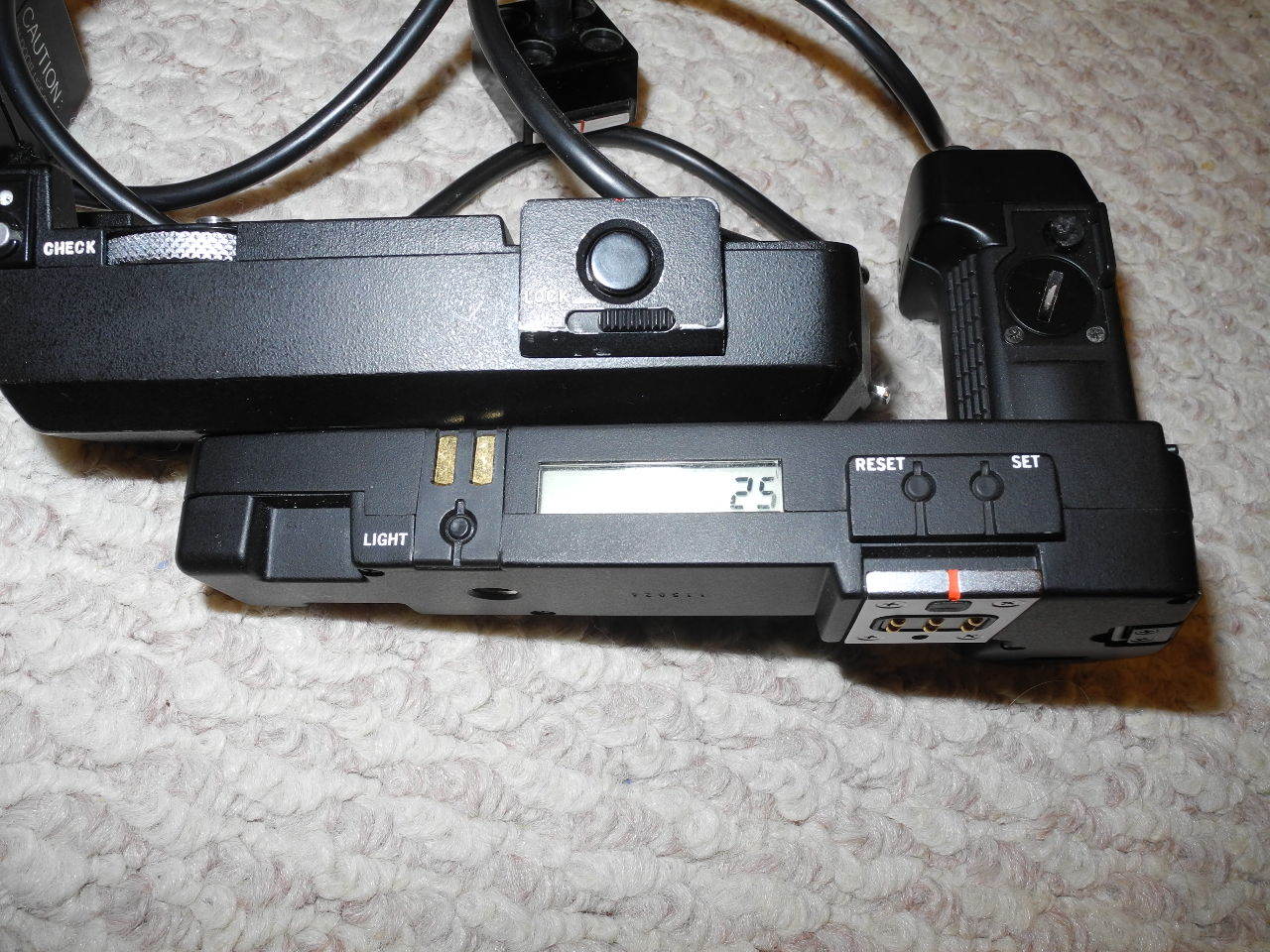 Olympus OM motor drive 2,  dead control pack 1 and charger