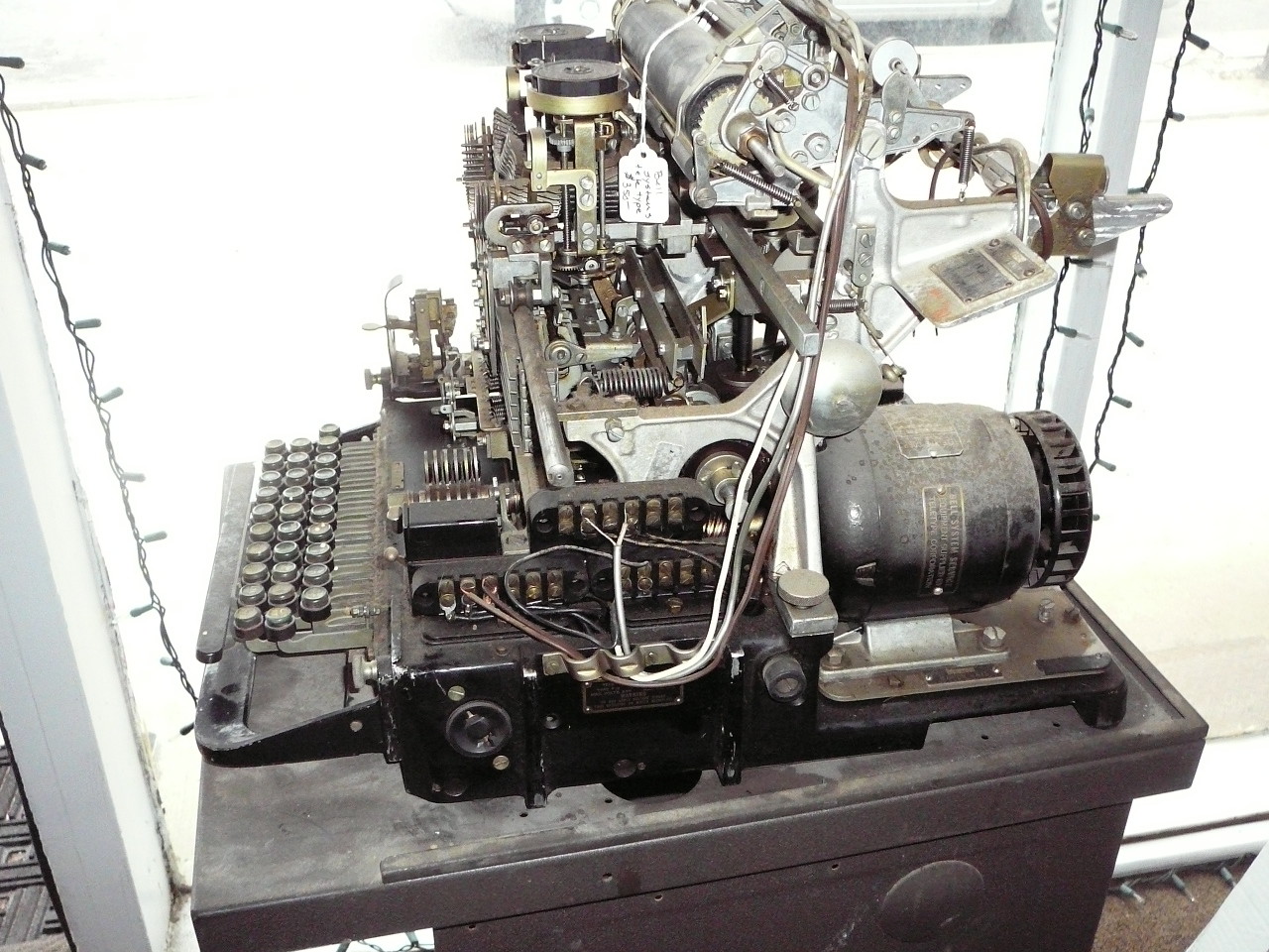 Vintage Bell Systems Teletype Machine - complete with stand