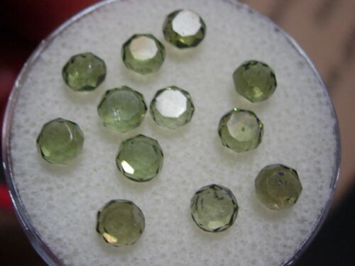 1 bead about .350 carats faceted 5mm wide Button Shaped MOLDAVITE with no holes