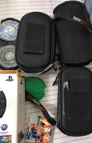 PSP Playstation system , Cases and 70+ UMD Games / Videos Lot