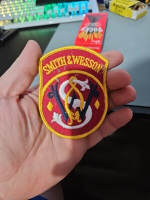 Vintage Smith & Wesson Firearms Red Logo Patch Handgun Advertising Hunting