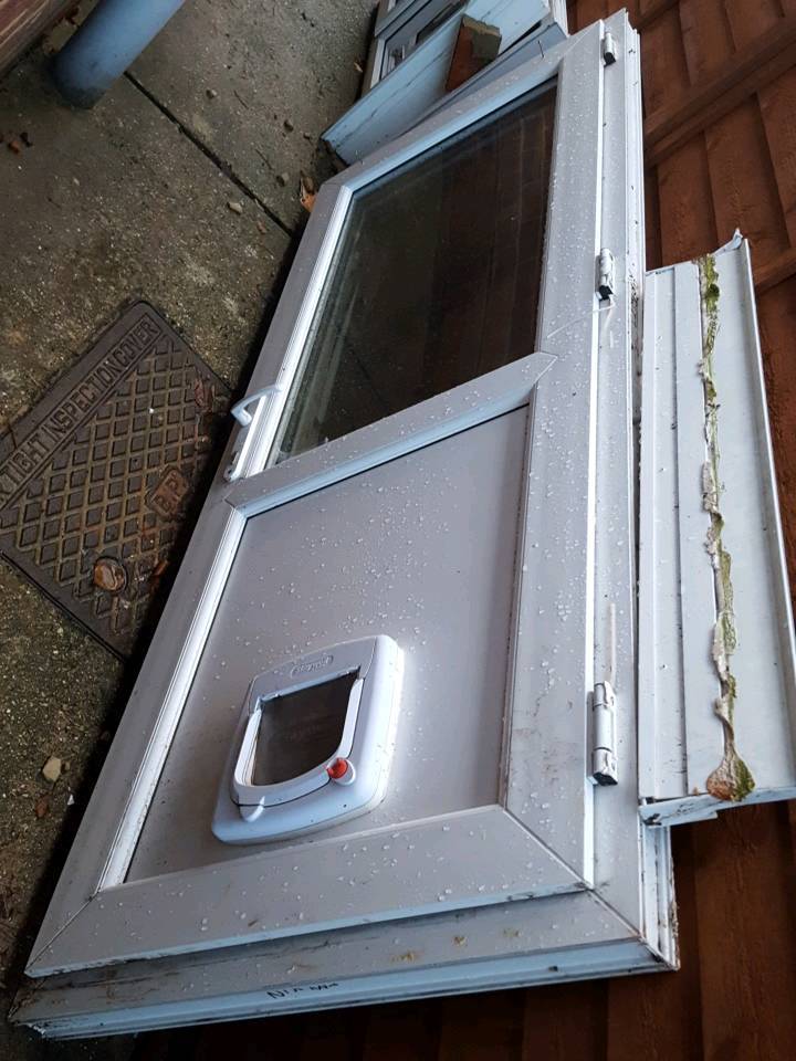 White PVC door with cat flap and frame surround | in North Baddesley