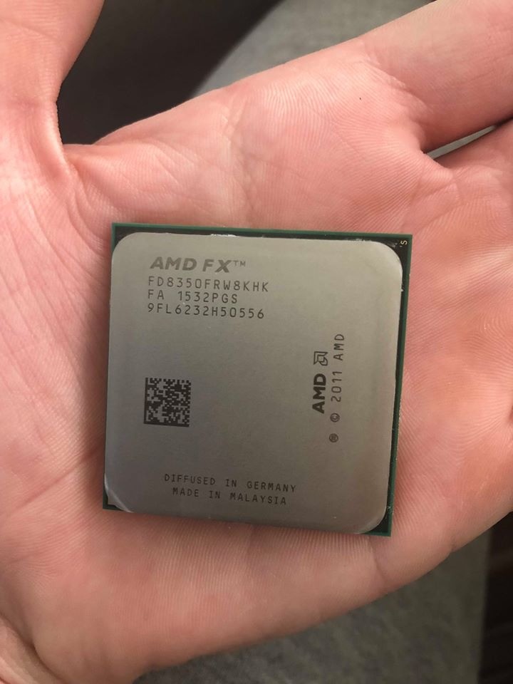 Amd fx 8350 цена. Процессор AMD FX 8350. FX 8350 на руке. Спалил fx8350. Охлад на FX 8350.