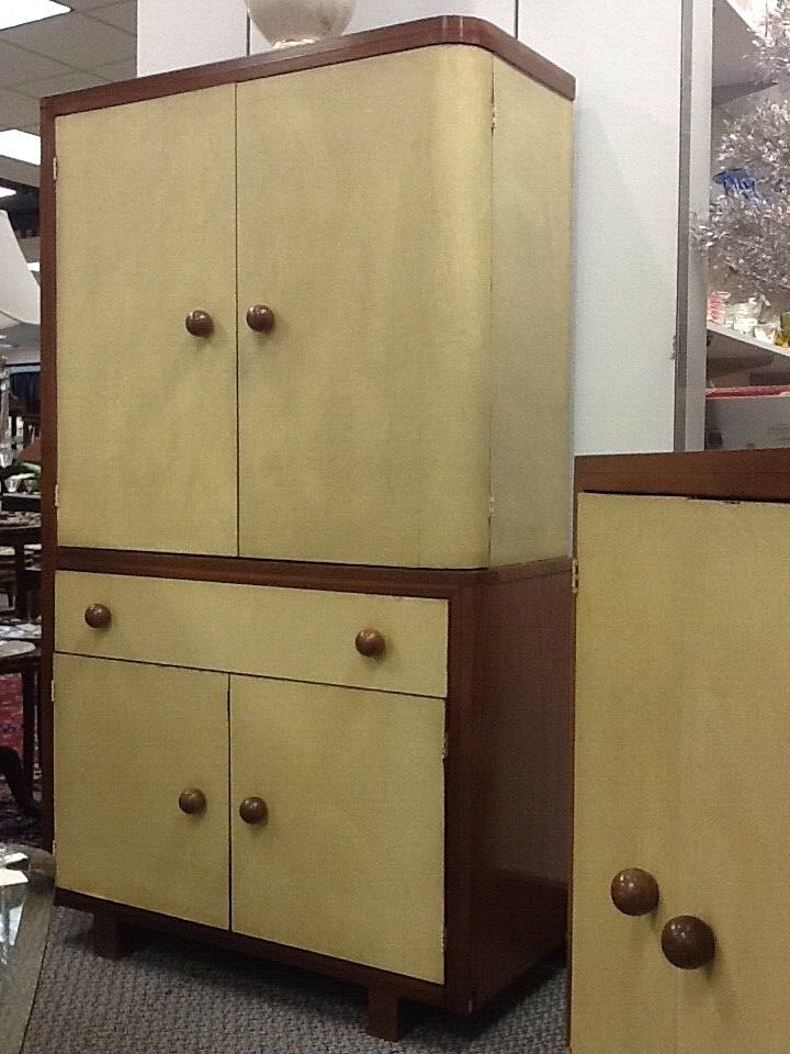 TWO 1938 ART DECO ASYMMETRICAL WALNUT CABINET WITH PARCHMENT FACINGS
