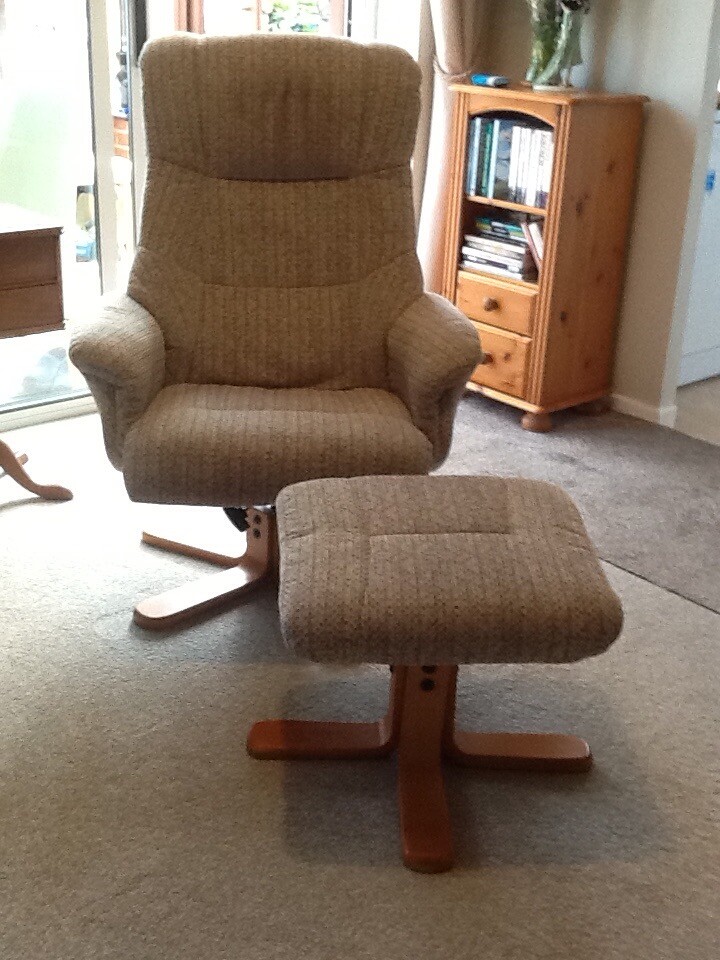 Recliner swivel chair. And matching footstool | in Norwich, Norfolk