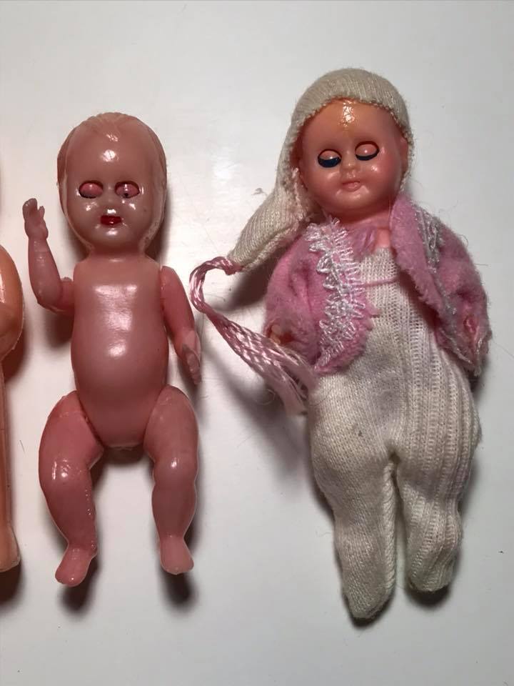 Set of 6 miniature plastic dolls
