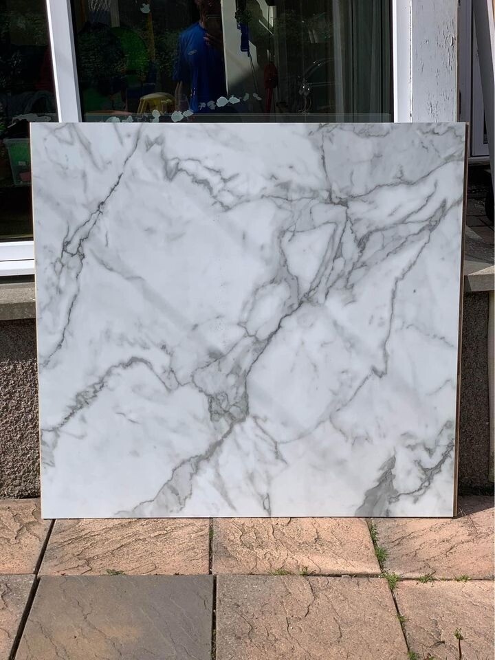 Multipanel Linda Barker Calacatta Marble shower wall panel offcuts in