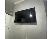 LOGIK 32 inch TV with bracket