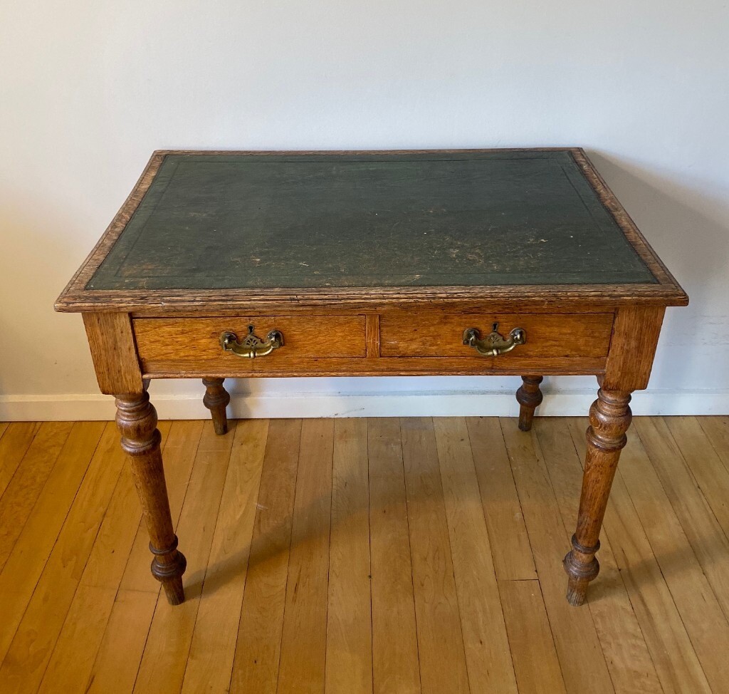 Antique Oak writing table with brass handles. Green tooled leather