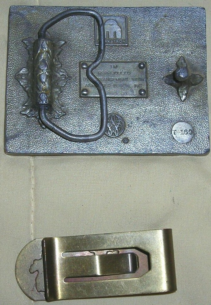 HANDMADE BUDWEISER HOOK RUG, BUDWEISER BELT BUCKLE, AND A MARLBORO MONEY CLIP