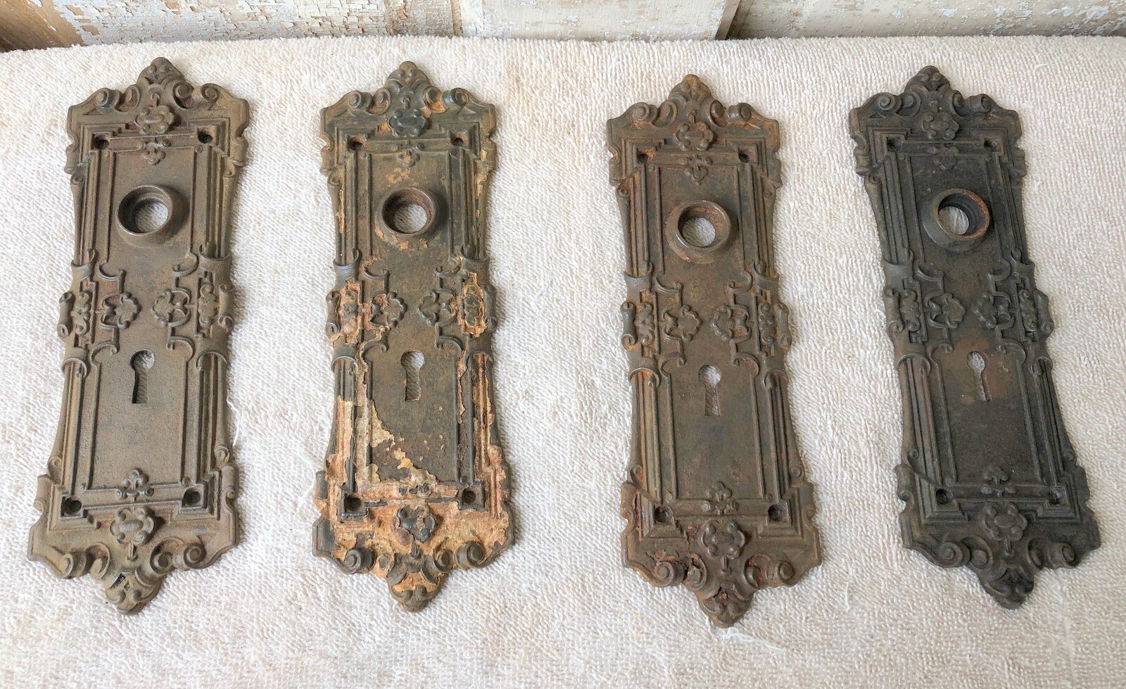 Lot of 8 Matching Antique Ornate Cast Iron Door Faceplates