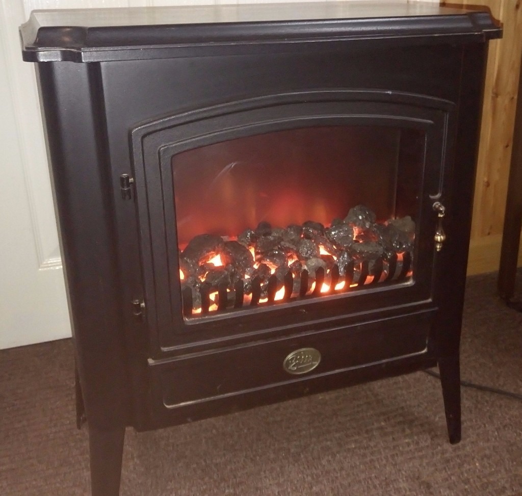 BERRY ELECTRIC FIRE/STOVE WITH FLAME EFFECT AND FAN in Wimborne, Dorset Gumtree