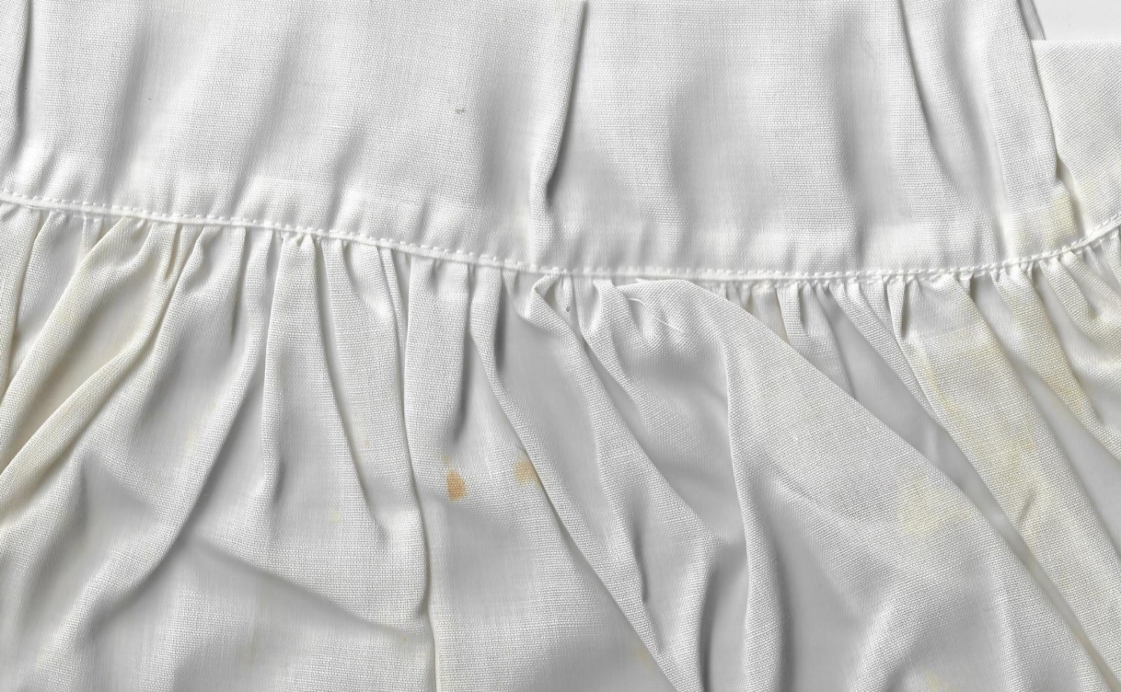 vintage  white  half apron with poinsettas and trimmed with embroidery-Christmas