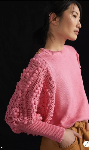 

Anthropologie Stella Pardo Fiorella Свитер с рукавами-помпонами крючком Розовый