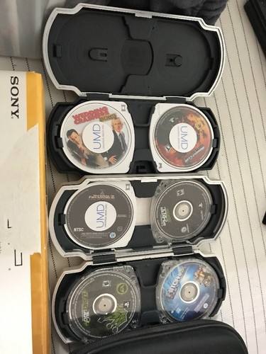 PSP Playstation system , Cases and 70+ UMD Games / Videos Lot