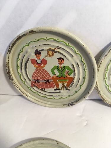 VINTAGE METAL COASTERS SET OF FOUR WOMAN IN HOOP DRESS MAN WITH Moustache CREAM