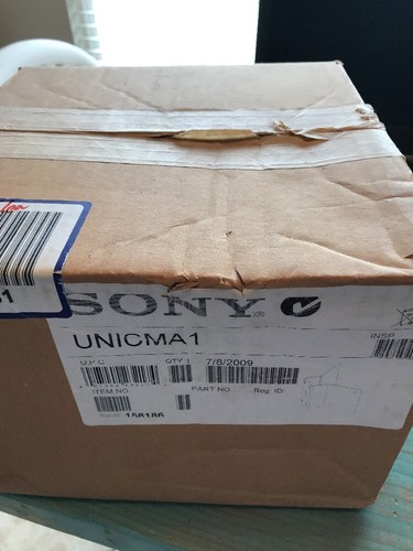 SONY Aluminum Corner Mount Adapter White Finish (requires UNI-WMB1) UNICMA1 Sign