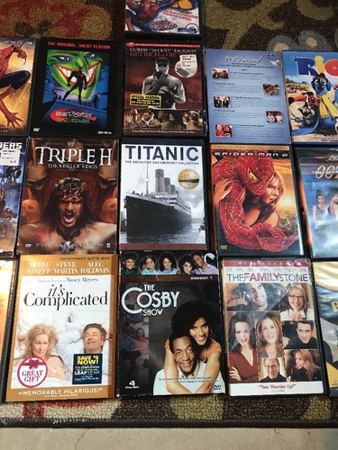 Wholesale lot of 16 DVD's: Drama Action Comedy Movies Cartoons Spider-Man