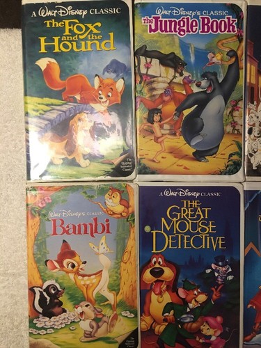 9 VHS LOT DISNEY MOVIES- BLACK DIAMOND- BEAUTY BEAST, ALADDIN, BAMBI, ROBIN HOOD