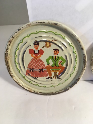VINTAGE METAL COASTERS SET OF FOUR WOMAN IN HOOP DRESS MAN WITH Moustache CREAM