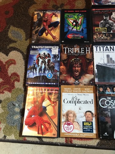 Wholesale lot of 16 DVD's: Drama Action Comedy Movies Cartoons Spider-Man