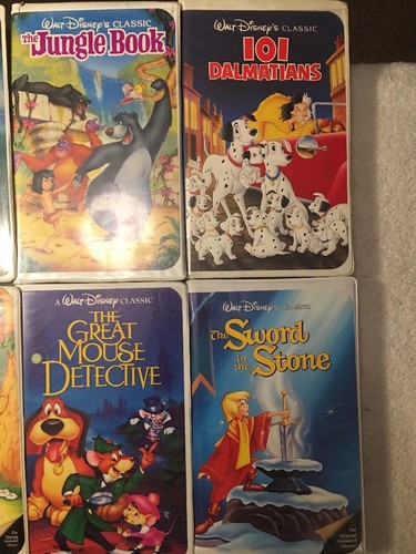 9 VHS LOT DISNEY MOVIES- BLACK DIAMOND- BEAUTY BEAST, ALADDIN, BAMBI, ROBIN HOOD