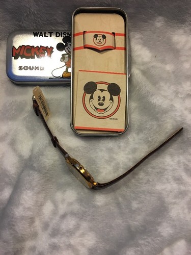 Mickey Watch, with dial window rotating Mickey through time