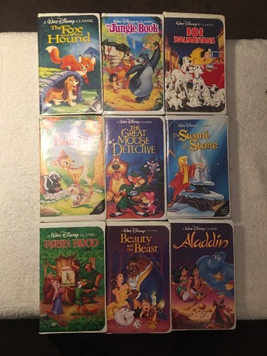 9 VHS LOT DISNEY MOVIES- BLACK DIAMOND- BEAUTY BEAST, ALADDIN, BAMBI, ROBIN HOOD