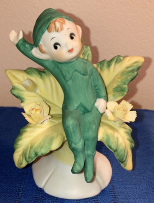 Vintage Brinn's Pixie Figurine Sitting on Flower EUC Label attached EUC