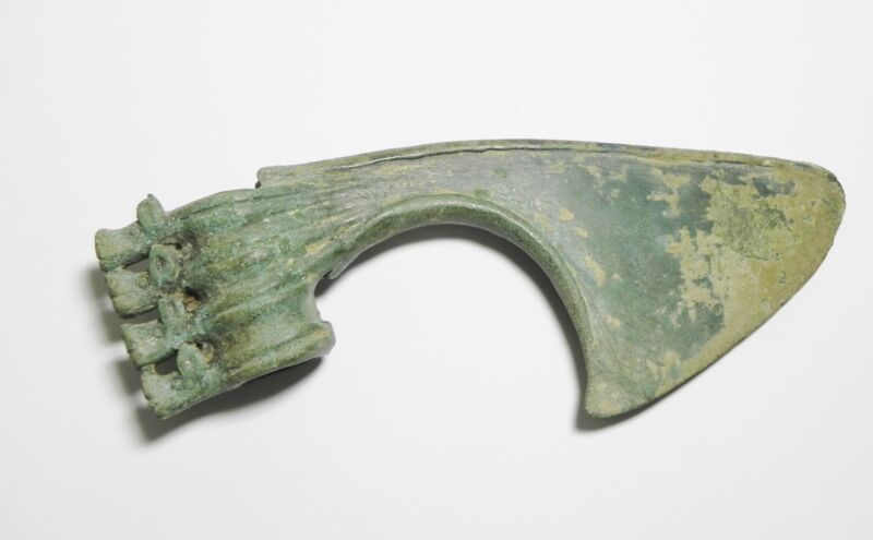 ZURQIEH - LURISTAN BRONZE AXE, DECORATED WITH A PIG HEADS , 1200 B.C