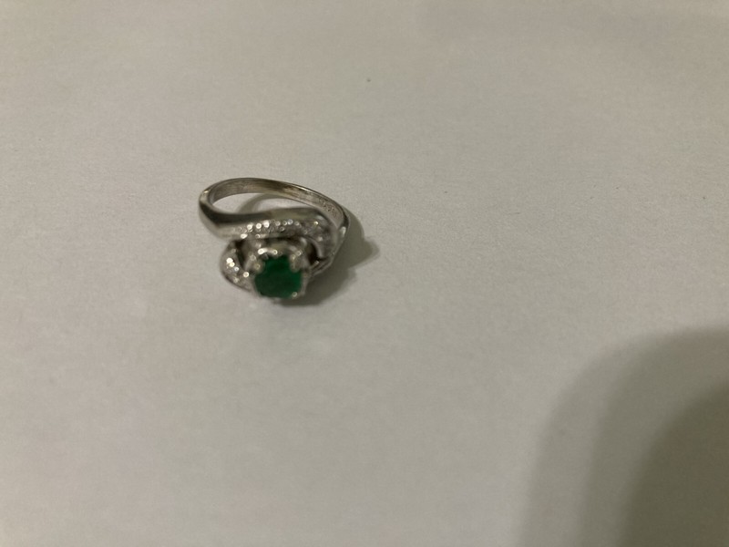 Ladies 18K White Gold Emerald & Diamond Ring w/Ten 1.0 mm single cut diamonds.