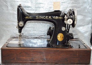 value of old singer sewing machine in wood case