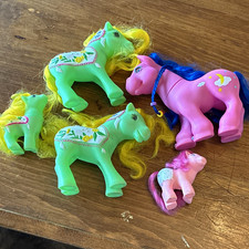 Lot of 4 Plastic My little Pony/Horse Figures...