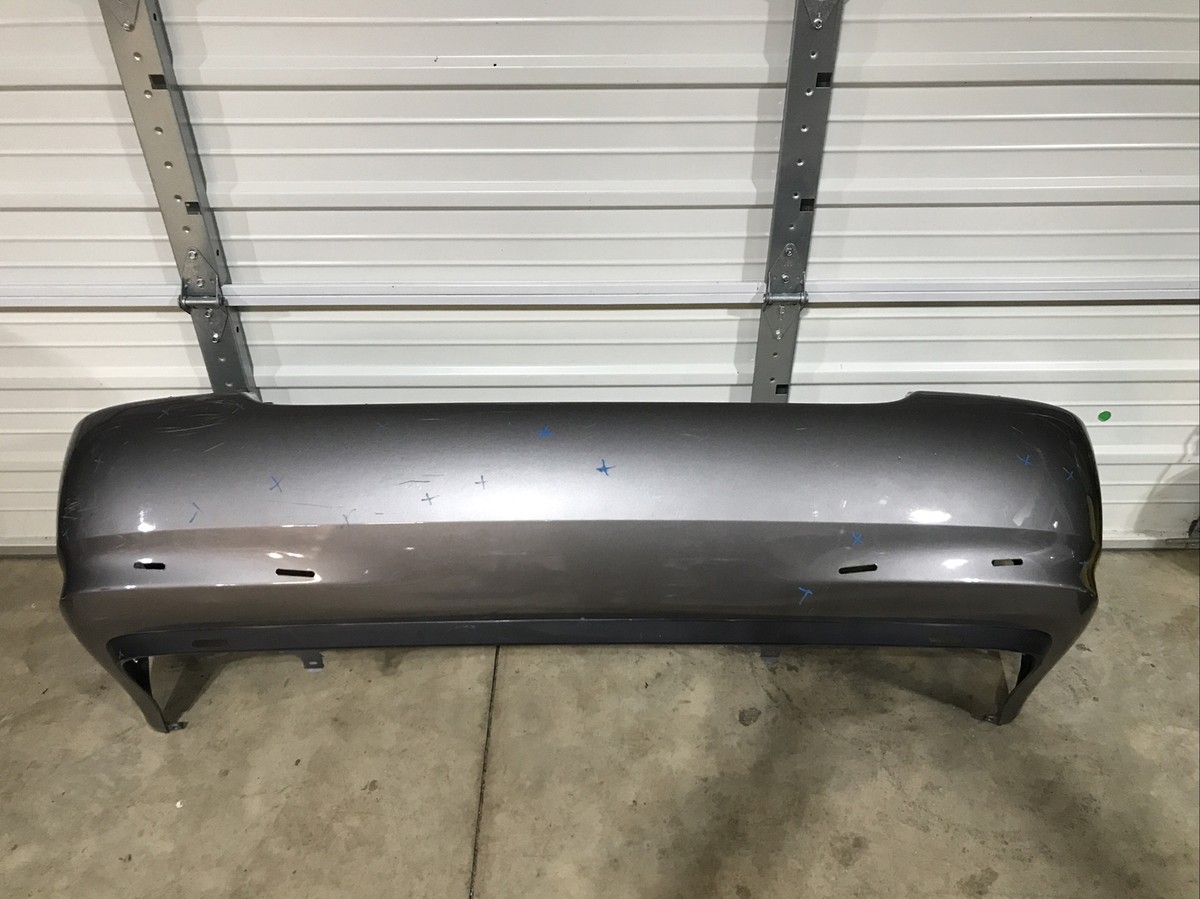 Rear Bumper Cover For 2003-2008 Toyota Corolla - Primed, CAPA Certified, With Spoiler Holes