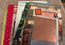 Tin punch pattern books (6) with piece of copper 5x7  and 4” Awl