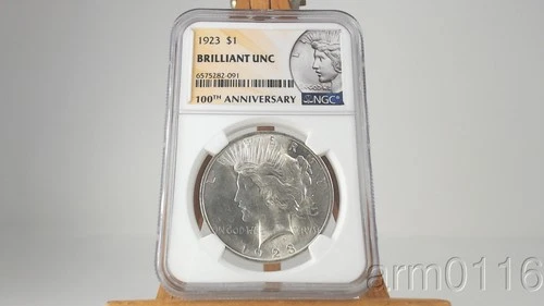1923 BU US MINT 90% SILVER PEACE DOLLAR ROUND COIN NGC GRADED BRILLANT UNC. $1