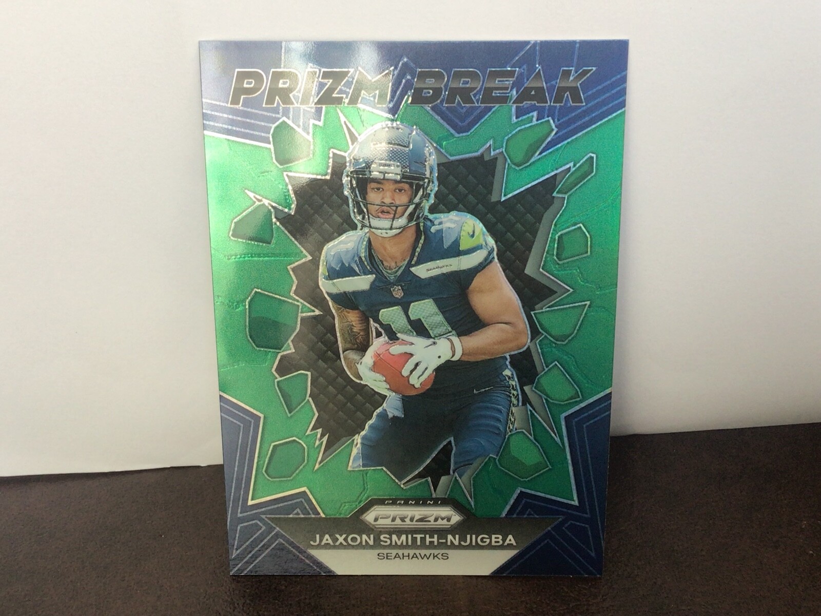 2023 Panini Prizm - Prizm Break Green Prizm #PB-2 Jaxon Smith-Njigba (RC)