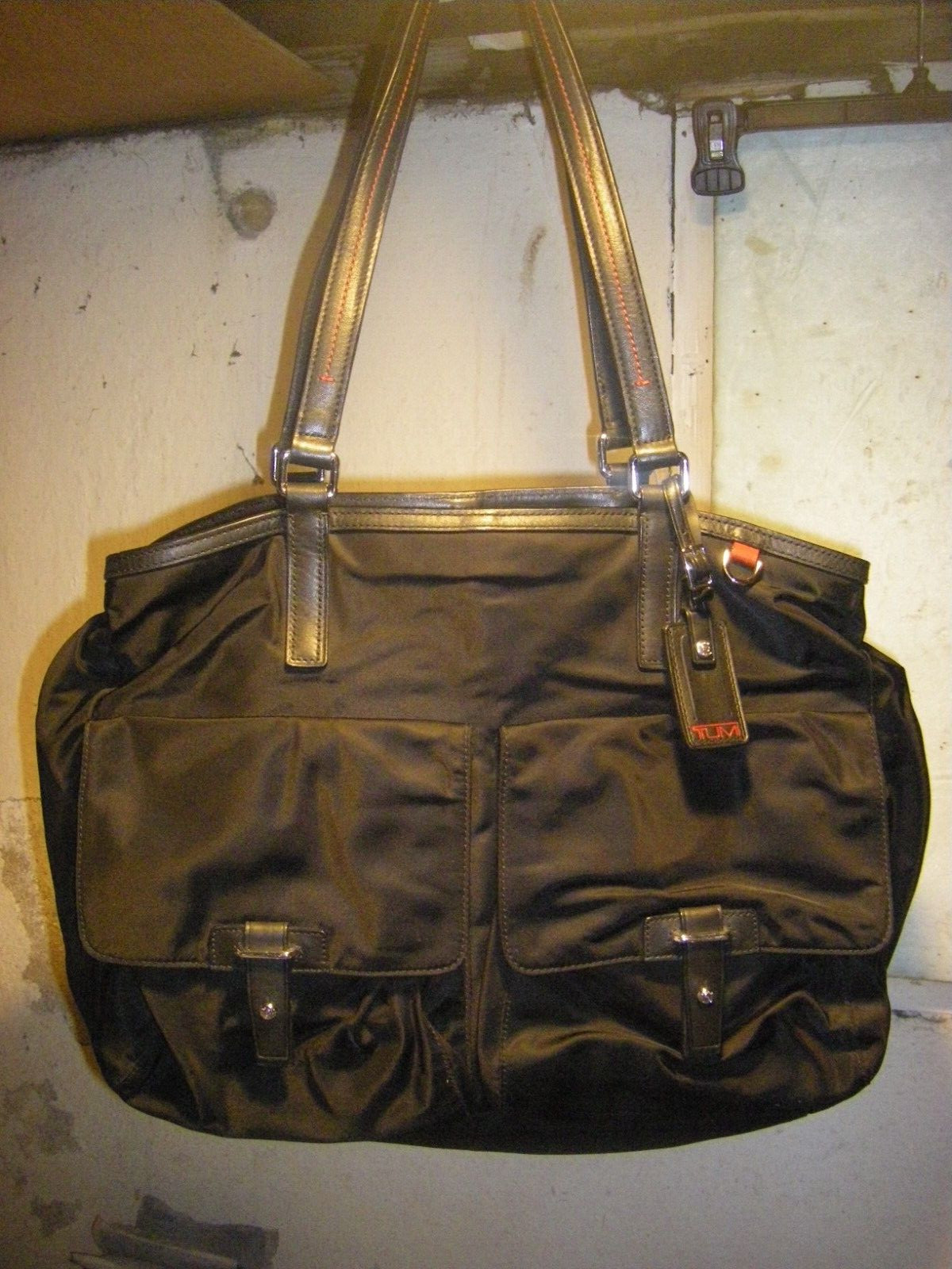 TUMI Black  Nylon Hand Bag/Purse  With Leather Trim