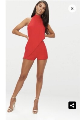 Pretty little thing red romper US size0 with a halter style and pull on style