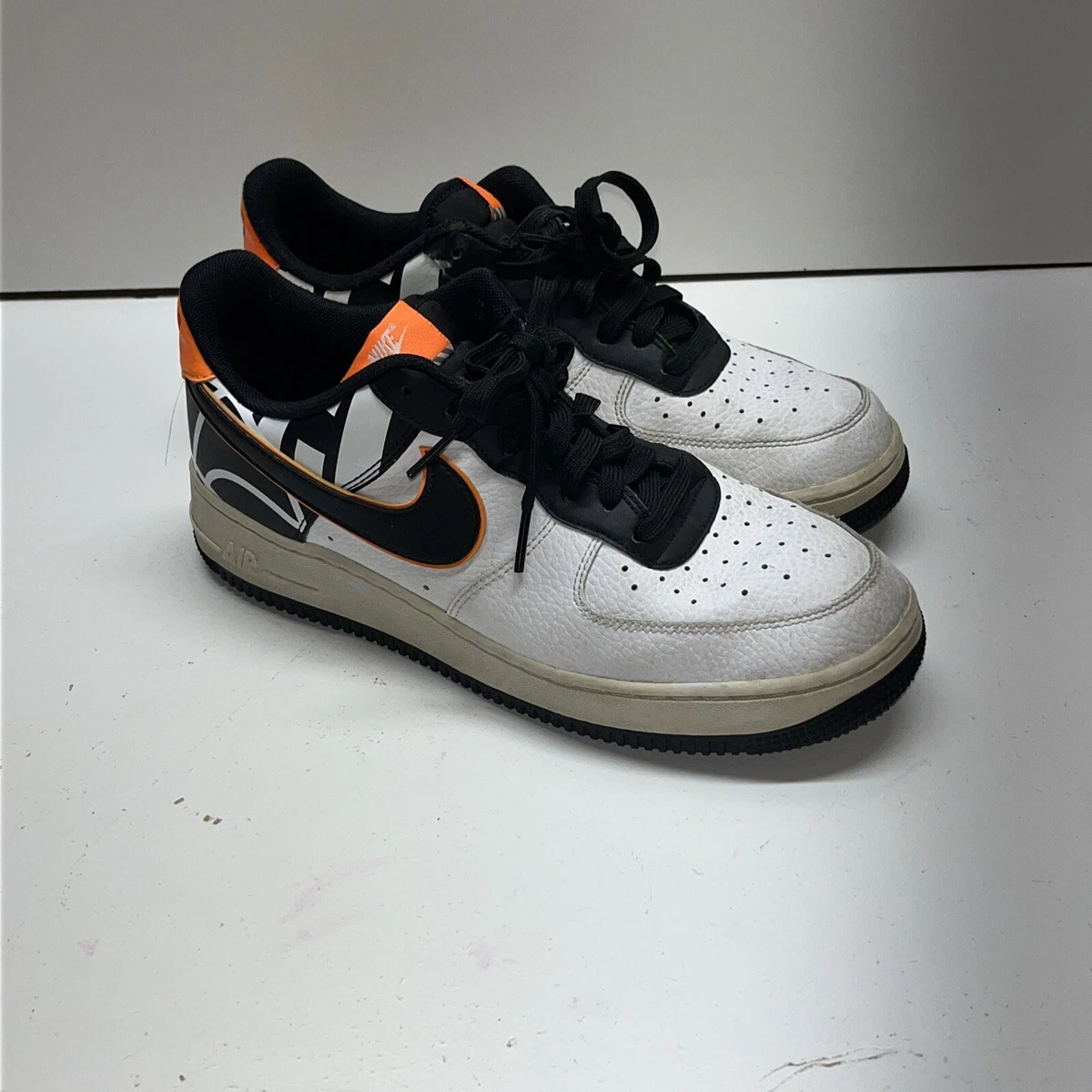 Nike Air Force 1 '07 LV8 sneakers in white, black and orange