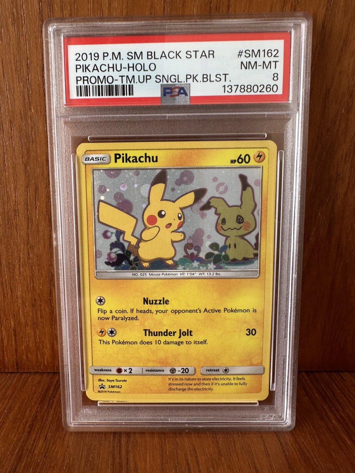 POKEMON TEAM UP SM BLACK STAR PROMO PIKACHU #SM162 HOLO PSA 8