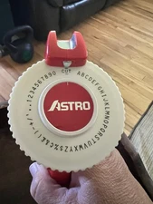 Vintage Astro Compact Handheld Rotary Label Maker Embosser Red with one refill  