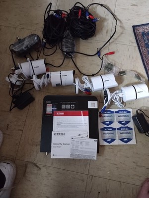 ZOSI Security Camera System with DVR and Warning Signs