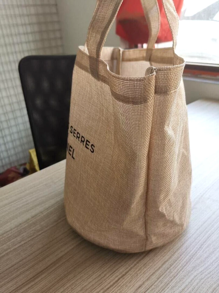 Bolso de Mano Chanel Novedad Dans Les Serres Camelia Dije Lino Beige con CC Foto 2 de 4