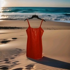Size Medium Beautiful Used Red Leather Dress. 95% Polyester and 5% Elastane.