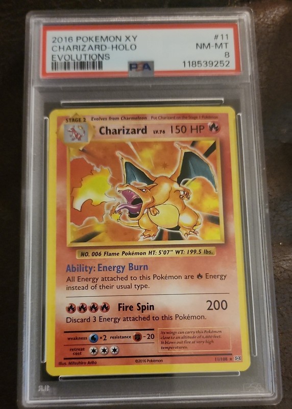 Charizard 11/108 Evolutions Holo PSA Graded 8 Near Mint To Mint